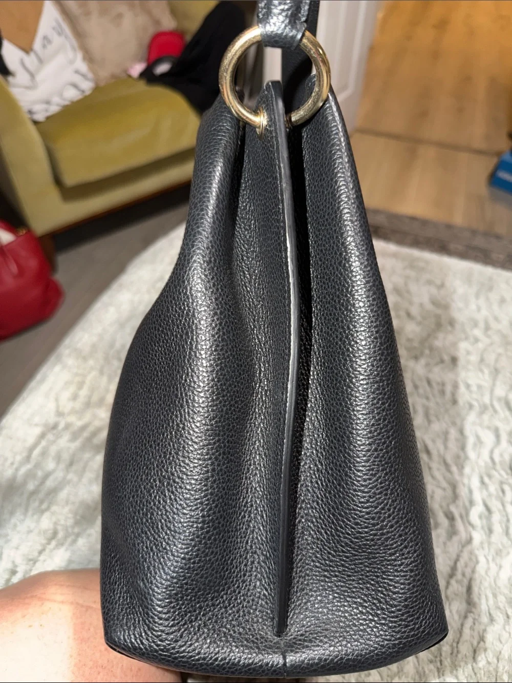 Coach bucket bag, likely the Charlie or Town model